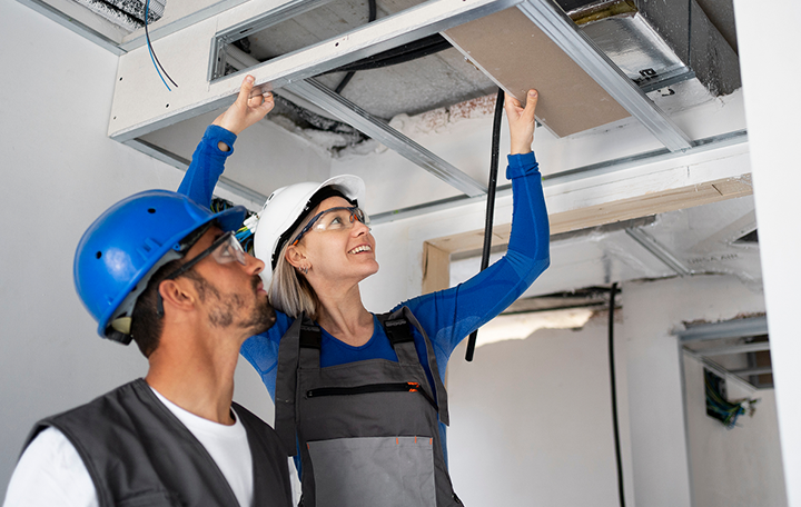 Technician installing an outdoor AC unit